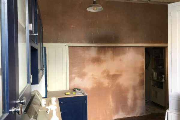 Some plastering the middle by the sink left for hygiene board #4